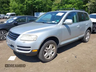2005 Volkswagen Touareg 4.2L V8 z VIN WVGZM77L15D080697, wystawiony jako IAAI lot #42399779 z przebiegiem 138 040 mil mil oraz . Historia ofert i sprzedaży dostępna na DreamBid. Obrazek 2.