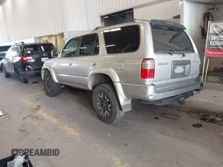 2000 Toyota 4Runner SR5 z VIN JT3HN86R6Y0294870, wystawiony jako IAAI lot #42131835 z przebiegiem 292 259 mil mil oraz . Historia ofert i sprzedaży dostępna na DreamBid. Obrazek 3.