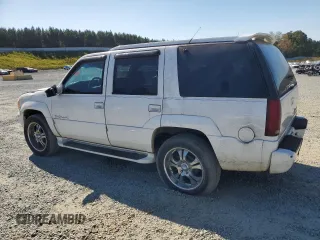 1999 Cadillac Escalade z VIN 1GYEK13R8XR411548, wystawiony jako Copart lot #75803424 z przebiegiem 277 712 mil mil oraz Szkody całkowita. Historia ofert i sprzedaży dostępna na DreamBid. Obrazek 2.