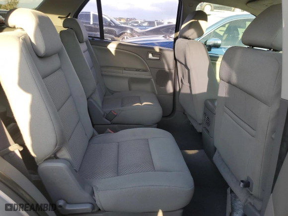 2007 Ford Freestyle SEL with VIN 1FMDK02177GA39019, listed as a Copart auction lot 73844164 with 185,083 mi miles and Salvage Title. Bid and sale history available at carsss.com. Image 11.