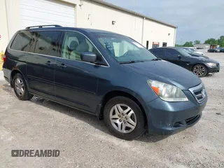 2006 Honda Odyssey EX with VIN 5FNRL384X6B401671, listed as a IAAI auction lot 42081914 with 229,219 mi miles. Bid and sale history available at carsss.com. Image 1.