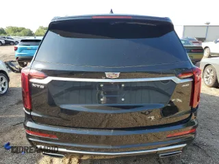 2020 Cadillac XT6 FWD Premium Luxury с VIN 1GYKPCRSXLZ174002, выставлен на аукционе Copart как лот 52083235 с пробегом 79 712 миль миль и Списание • Salvage title. История ставок и продаж доступна на DreamBid. Изображение 6.