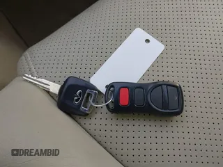 2005 Infiniti G35 z VIN JNKCV51E25M219854, wystawiony jako IAAI lot #41798749 z przebiegiem 221 085 mil mil oraz . Historia ofert i sprzedaży dostępna na DreamBid. Obrazek 11.