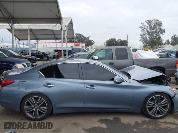 2015 Infiniti Q50 Premium with VIN JN1BV7AP1FM351633, listed as a IAAI auction lot 41880366 with 106,564 mi miles. Bid and sale history available at carsss.com. Image 14.