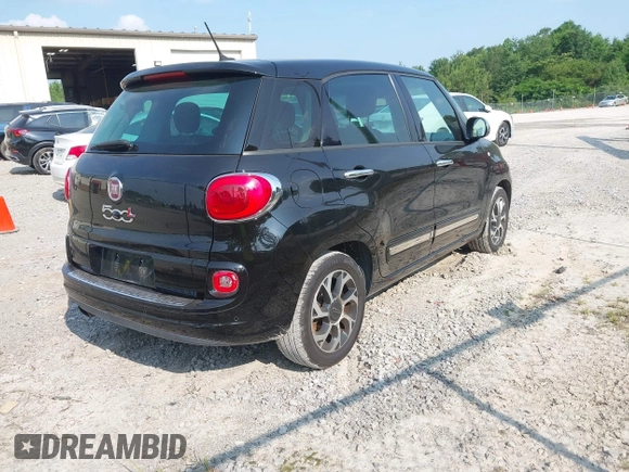 2014 FIAT 500L Lounge with VIN ZFBCFACH6EZ021783, listed as a IAAI auction lot 42429902 with 129,868 mi miles and . Bid and sale history available at DreamBid. Image 4.
