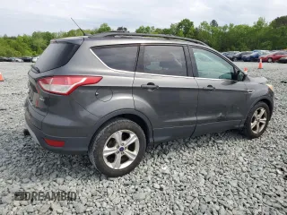 2015 Ford Escape SE with VIN 1FMCU9G94FUA91796, listed as a Copart auction lot 53605895 with 165,353 mi miles and Salvage Title. Bid and sale history available at DreamBid. Image 3.
