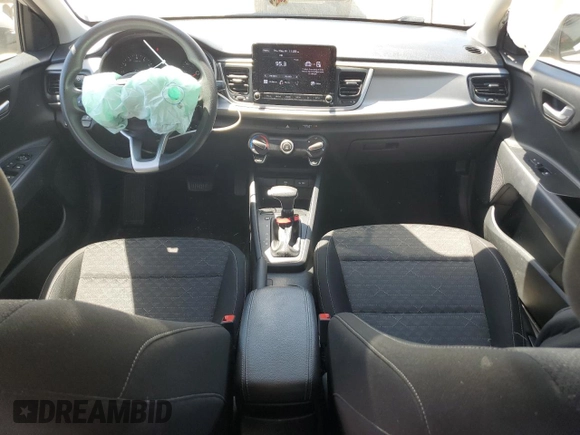 2021 Kia Rio S with VIN 3KPA24AD5ME382580, listed as a Copart auction lot 56931054 with 63,445 mi miles and Salvage Title. Bid and sale history available at DreamBid. Image 8.