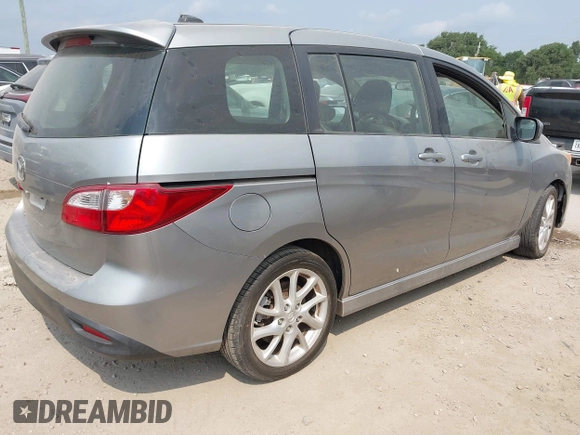 2012 Mazda 5 Grand Touring z VIN JM1CW2DL1C0126545, wystawiony jako IAAI lot #42301130 z przebiegiem 151 212 mil mil oraz . Historia ofert i sprzedaży dostępna na DreamBid. Obrazek 4.