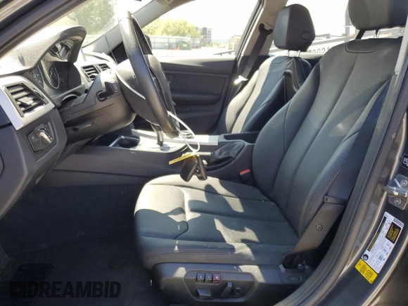 2014 BMW 3 Series 320i with VIN WBA3B1C54EK132952, listed as a Copart auction lot 63653435 with 63,260 mi miles and Salvage title. Bid and sale history available at DreamBid. Image 7.