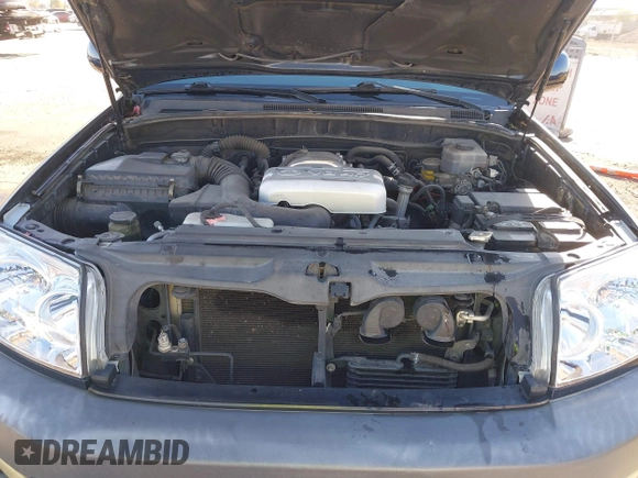 2003 Toyota 4Runner SR5 with VIN JTEZT14R238001097, listed as a IAAI auction lot 41266011 with 180,905 mi miles. Bid and sale history available at carsss.com. Image 10.