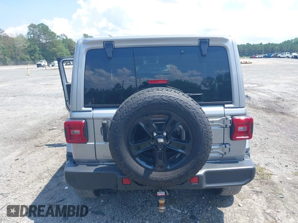 2021 Jeep Wrangler Unlimited Sahara with VIN 1C4HJXEN3MW628845, listed as a IAAI auction lot 42438049 with 49,970 mi miles and . Bid and sale history available at DreamBid. Image 16.