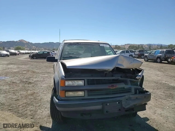 1999 Chevrolet Tahoe with VIN 3GNEK18R5XG184695, listed as a Copart auction lot 67697224 with 135,316 mi miles and Salvage Title. Bid and sale history available at carsss.com. Image 11.