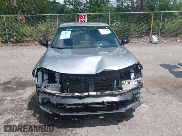 2022 Honda Civic Sport z VIN 2HGFE2F58NH586977, wystawiony jako IAAI lot #42202088 z przebiegiem 56 060 mil mil oraz . Historia ofert i sprzedaży dostępna na DreamBid. Obrazek 12.