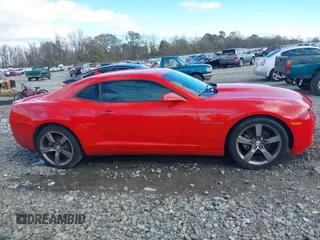 2012 Chevrolet Camaro 1LT z VIN 2G1FB1E3XC9203347, wystawiony jako IAAI lot #41261932 z przebiegiem 106 070 mil mil oraz . Historia ofert i sprzedaży dostępna na DreamBid. Obrazek 13.