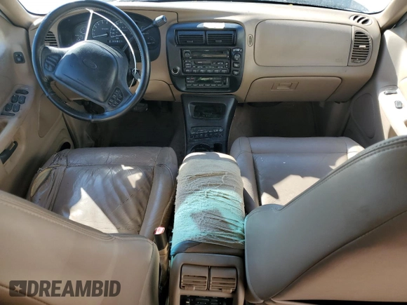 1999 Ford Explorer XLT z VIN 1FMZU32E8XUA72715, wystawiony jako Copart lot #41881985 z przebiegiem 242 982 mil mil oraz Szkoda całkowita • Salvage title. Historia ofert i sprzedaży dostępna na DreamBid. Obrazek 8.