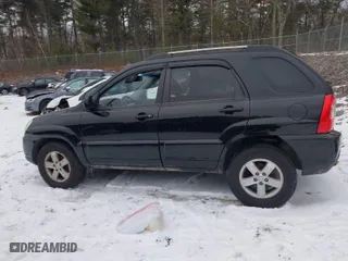 2009 Kia Sportage LX with VIN KNDJE723897629953, listed as a IAAI auction lot 41323094 with 157,334 mi miles. Bid and sale history available at carsss.com. Image 15.