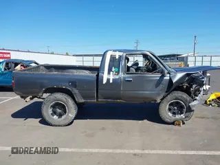 1990 Toyota Pickup SR5 z VIN JT4VN13G7L5019822, wystawiony jako IAAI lot #42194555 z przebiegiem 255 628 mil mil oraz . Historia ofert i sprzedaży dostępna na DreamBid. Obrazek 14.