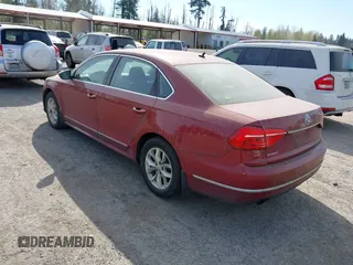 2016 Volkswagen Passat 1.8T S with VIN 1VWAT7A33GC008970, listed as a IAAI auction lot 42046831 with 167,533 mi miles. Bid and sale history available at carsss.com. Image 3.