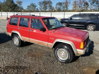1993 Jeep Cherokee z VIN 1J4FT78S9PL634409, wystawiony jako Copart lot #77034984 z przebiegiem 146 585 mil mil oraz Szkoda całkowita • Salvage title. Historia ofert i sprzedaży dostępna na DreamBid. Obrazek 4.