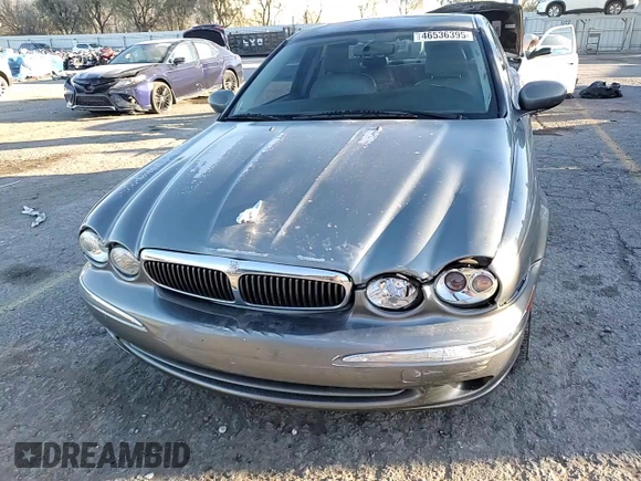 2004 Jaguar X-Type with VIN SAJEA51C74WD70684, listed as a Copart auction lot 46536395 with 155,184 mi miles and Salvage Title. Bid and sale history available at carsss.com. Image 11.