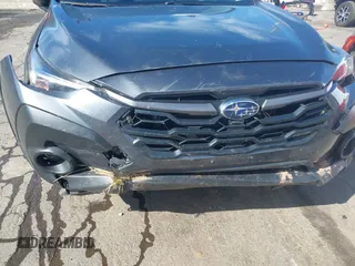 2024 Subaru Crosstrek Premium z VIN JF2GUADC3RH204109, wystawiony jako IAAI lot #41800147 z przebiegiem 31 619 mil mil oraz . Historia ofert i sprzedaży dostępna na DreamBid. Obrazek 12.