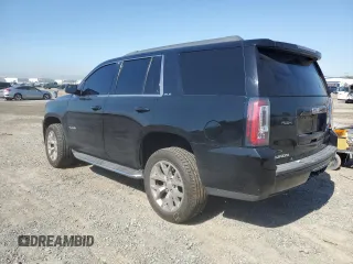 2019 GMC Yukon SLE with VIN 1GKS1AKC9KR166202, listed as a Copart auction lot 50103275 with 55,208 mi miles and Salvage Title. Bid and sale history available at carsss.com. Image 2.