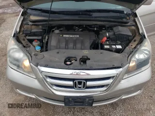 2007 Honda Odyssey EX with VIN 5FNRL38427B513477, listed as a Copart auction lot 62457695 with 216,977 mi miles and Salvage title. Bid and sale history available at DreamBid. Image 12.