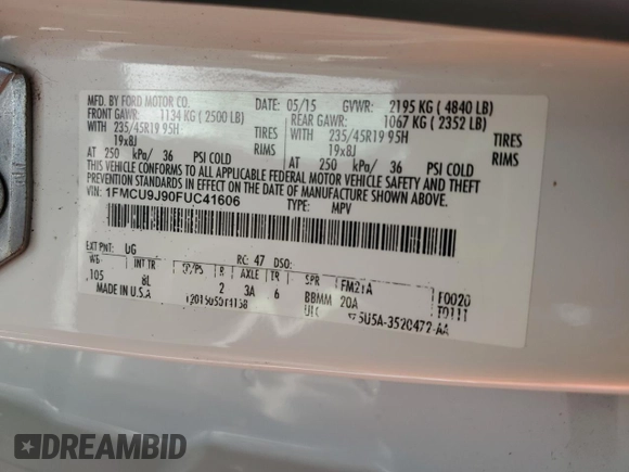 2015 Ford Escape Titanium z VIN 1FMCU9J90FUC41606, wystawiony jako Copart lot #57458455 z przebiegiem 71 671 mil mil oraz Szkoda całkowita • Salvage title. Historia ofert i sprzedaży dostępna na DreamBid. Obrazek 14.