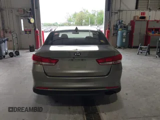 2016 Kia Optima LX with VIN 5XXGT4L33GG026183, listed as a IAAI auction lot 42156799 with 163,000 mi miles and . Bid and sale history available at carsss.com. Image 16.