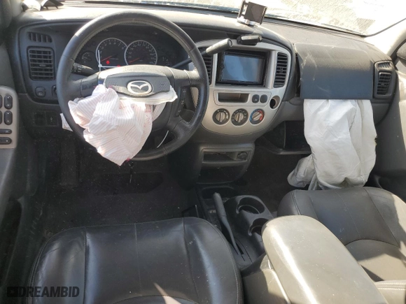 2004 Mazda Tribute ES with VIN 4F2CZ06114KM02980, listed as a Copart auction lot 77319964 with 178,922 mi miles and Salvage Title. Bid and sale history available at carsss.com. Image 8.