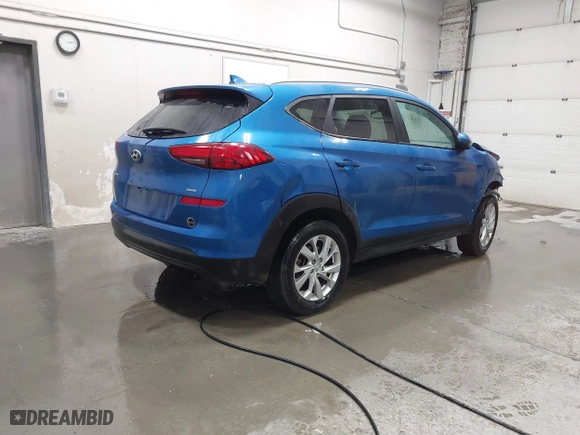 2020 Hyundai Tucson Value with VIN KM8J3CA49LU144699, listed as a IAAI auction lot 41614563 with 58,048 mi miles. Bid and sale history available at carsss.com. Image 4.