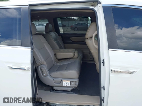 2011 Honda Odyssey EX-L with VIN 5FNRL5H67BB011070, listed as a IAAI auction lot 42491685 with 200,671 mi miles and . Bid and sale history available at DreamBid. Image 8.