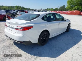 2025 Toyota Camry LE with VIN 4T1DAACK0SU551828, listed as a IAAI auction lot 41823385 with Not Provided miles and . Bid and sale history available at DreamBid. Image 4.