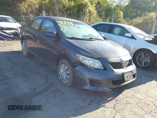2009 Toyota Corolla with VIN 1NXBU40E89Z070007, listed as a IAAI auction lot 41986163 with 153,621 mi miles and . Bid and sale history available at DreamBid. Image 1.