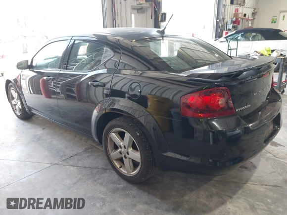 2014 Dodge Avenger SE with VIN 1C3CDZAB0EN202602, listed as a IAAI auction lot 42133657 with 130,741 mi miles. Bid and sale history available at carsss.com. Image 3.