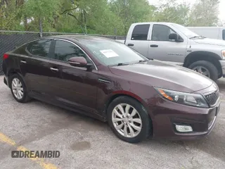 2014 Kia Optima EX z VIN 5XXGN4A71EG321621, wystawiony jako IAAI lot #42077320 z przebiegiem 169 372 mil mil oraz . Historia ofert i sprzedaży dostępna na DreamBid. Obrazek 1.