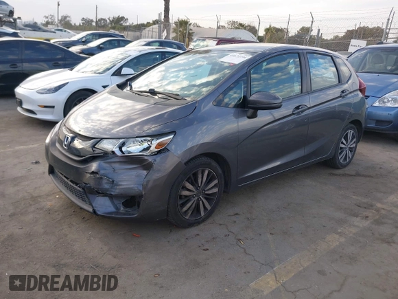 2015 Honda Fit LX with VIN 3HGGK5H5XFM719477, listed as a IAAI auction lot 41671194 with 145,876 mi miles. Bid and sale history available at carsss.com. Image 2.