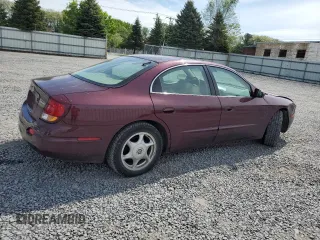 2003 Oldsmobile Aurora z VIN 1G3GS64C134163544, wystawiony jako Copart lot #58706705 z przebiegiem 104 447 mil mil oraz Szkody całkowita. Historia ofert i sprzedaży dostępna na DreamBid. Obrazek 3.