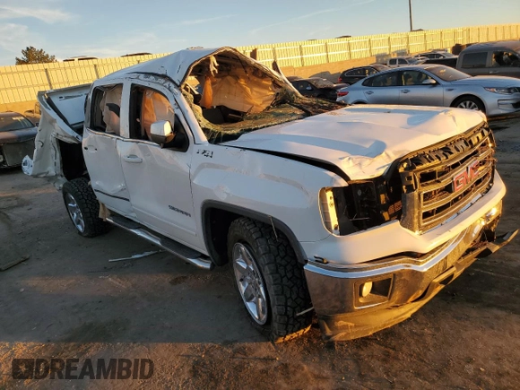 2015 GMC Sierra 1500 SLE z VIN 3GTU2UEC6FG148082, wystawiony jako Copart lot #77706584 z przebiegiem Nie podano mil oraz Szkoda całkowita • Salvage title. Historia ofert i sprzedaży dostępna na DreamBid. Obrazek 4.