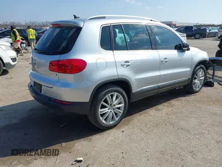 2013 Volkswagen Tiguan SE with VIN WVGAV7AX4DW545658, listed as a IAAI auction lot 41523168 with 188,729 mi miles and . Bid and sale history available at DreamBid. Image 4.