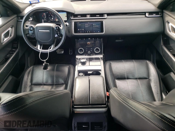 2018 Land Rover Range Rover Velar R-Dynamic SE с VIN SALYL2RV1JA730668, выставлен на аукционе Copart как лот 49334985 с пробегом 82 782 миль миль и Списание • Salvage title. История ставок и продаж доступна на DreamBid. Изображение 8.