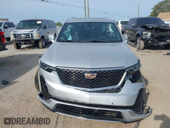 2020 Cadillac XT6 FWD Premium Luxury z VIN 1GYKPCRSXLZ136057, wystawiony jako IAAI lot #42211514 z przebiegiem 32 476 mil mil oraz . Historia ofert i sprzedaży dostępna na DreamBid. Obrazek 12.