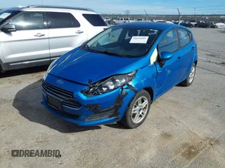 2017 Ford Fiesta SE with VIN 3FADP4EJ2HM158151, listed as a IAAI auction lot 41624161 with 61,284 mi miles. Bid and sale history available at carsss.com. Image 2.