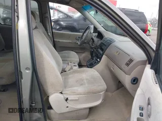 2005 Kia Sedona LX with VIN KNDUP132656734193, listed as a IAAI auction lot 41892342 with 91,768 mi miles. Bid and sale history available at carsss.com. Image 5.