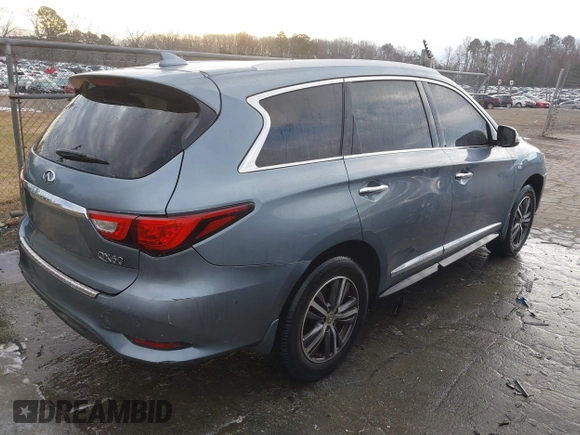 2016 Infiniti QX60 with VIN 5N1AL0MM9GC504320, listed as a IAAI auction lot 41290382 with 71,358 mi miles and . Bid and sale history available at DreamBid. Image 4.