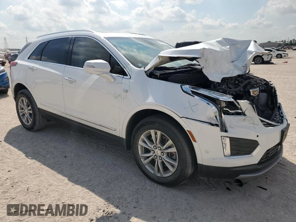 2023 Cadillac XT5 FWD Premium Luxury with VIN 1GYKNCRS7PZ150378, listed as a Copart auction lot 71792184 with 21,631 mi miles and Salvage Title. Bid and sale history available at carsss.com. Image 4.
