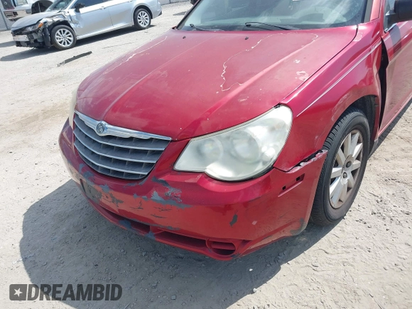 2010 Chrysler Sebring Touring with VIN 1C3CC4FB6AN192960, listed as a IAAI auction lot 42131287 with 117,314 mi miles. Bid and sale history available at carsss.com. Image 12.