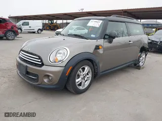 2013 MINI Cooper Clubman with VIN WMWZF3C51DT489508, listed as a IAAI auction lot 41748025 with 65,305 mi miles. Bid and sale history available at carsss.com. Image 2.
