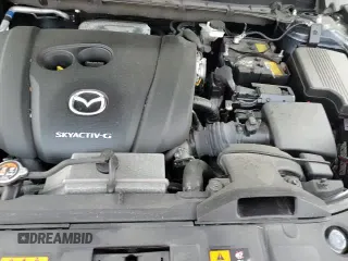 2022 Mazda CX-5 S Carbon Edition z VIN JM3KFBCM2N1572973, wystawiony jako Copart lot #68870425 z przebiegiem 72 043 mil mil oraz Szkoda całkowita • Salvage title. Historia ofert i sprzedaży dostępna na DreamBid. Obrazek 14.