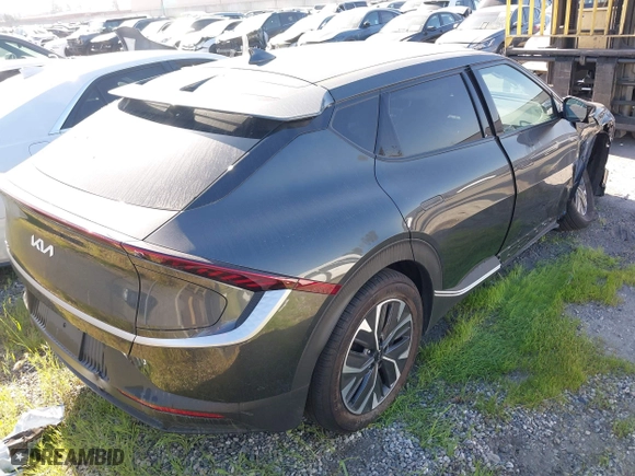 2024 Kia EV6 Wind with VIN KNDC34LA4R5620060, listed as a IAAI auction lot 41690690 with 5,348 mi miles. Bid and sale history available at carsss.com. Image 4.
